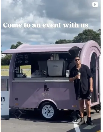 AE Brew pink mobile coffee trailer at an event