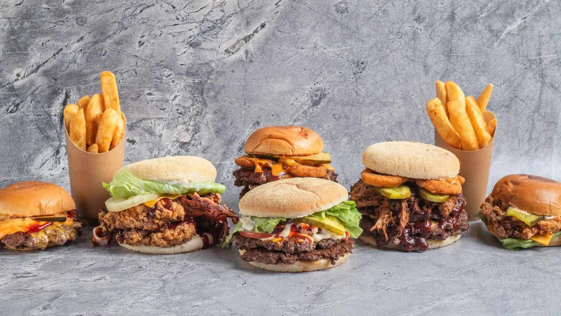 Burgers and fries served at an Auckland street food event