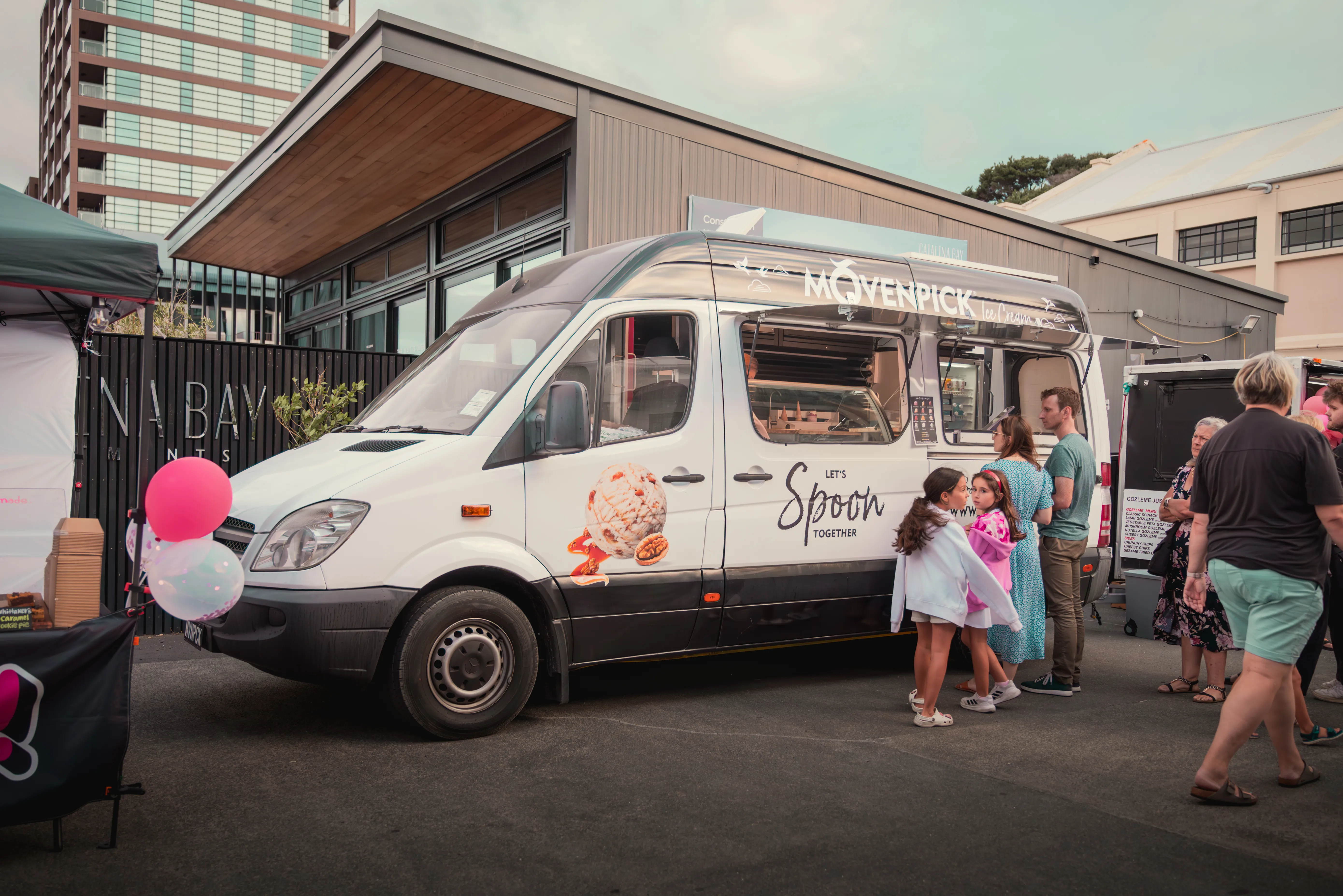Mövenpick on Wheels ice cream van serving customers at an Auckland event