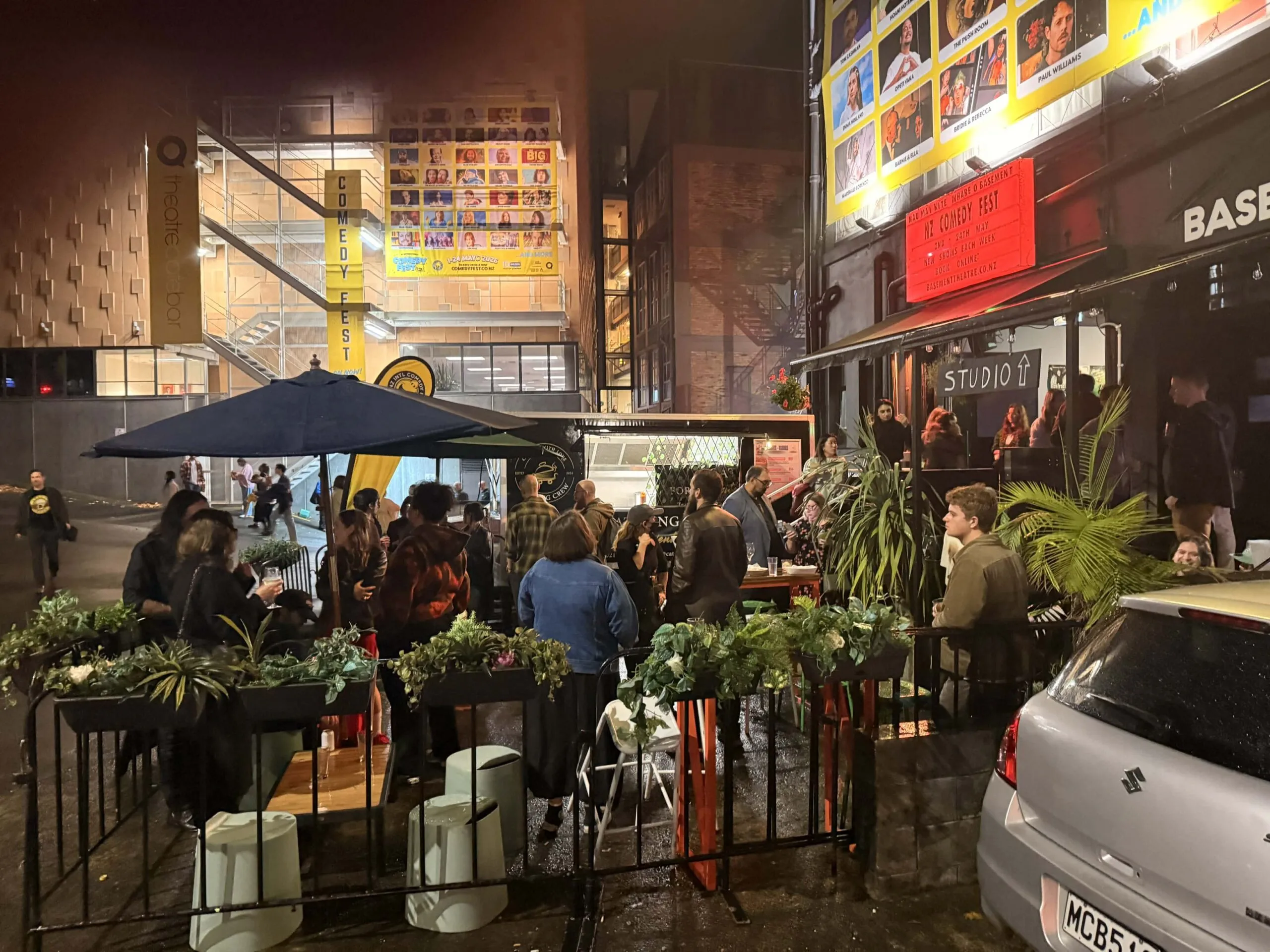 A food truck serving guests at a night market in Auckland